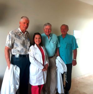 From left to right Bob Lilly, Ana Camarillo, M.D., Lee Roy Jordan and Jackie Sherrill at Hospital Galenia in Cancun, Mexico.